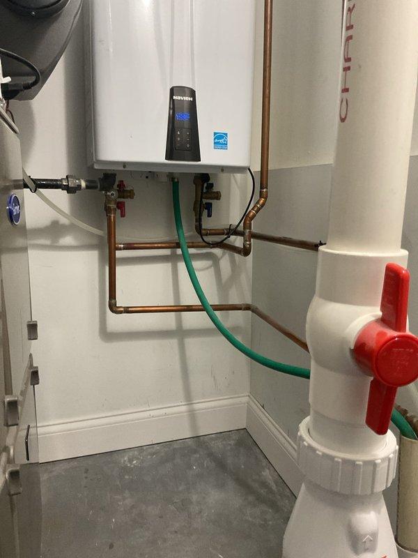 Responded to emergency flooding situation affecting entire residence. Upon arrival, diagnosed failed ejector pump system causing backup and water intrusion throughout property. Inspected mechanical room containing tankless water heater, sump pump assembly, and waste pump system with PVC drainage piping. Identified malfunctioning ejector pump unit with compromised float switch and discharge capabilities. Cleared standing water from affected areas and tested pump operation. Verified proper function of check valves, discharge piping, and electrical connections to pump system. Restored waste water removal capabilities and confirmed proper drainage flow through vertical waste stack. System returned to full operational status with no further flooding observed.