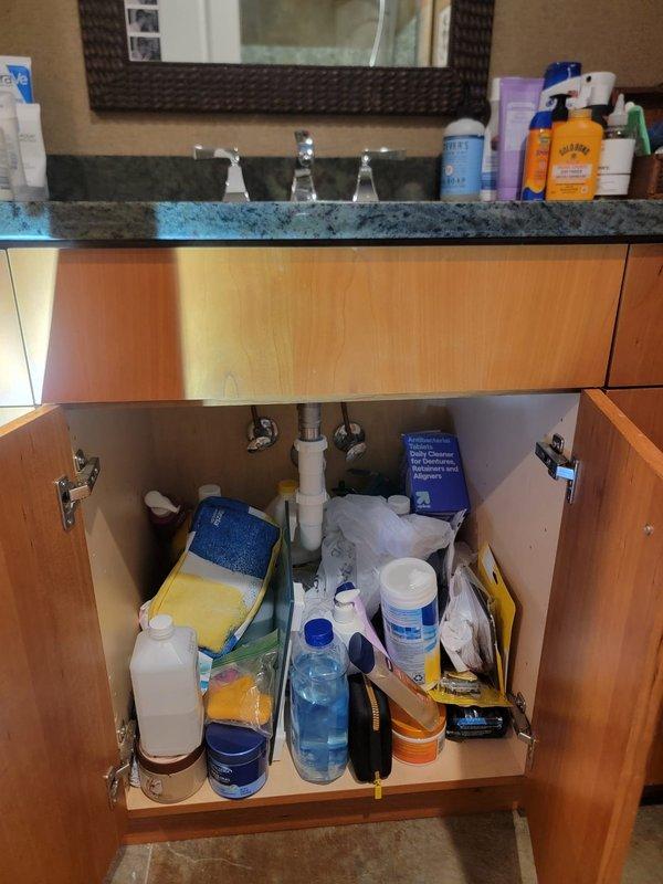 Completed comprehensive annual plumbing maintenance inspection throughout the residence, checking all fixtures, supply lines, and drain systems for proper operation and potential issues. Diagnosed and repaired a continuously running toilet by identifying faulty flapper valve mechanism and adjusting fill valve settings to restore proper flush cycle and eliminate water waste. Inspected under-sink plumbing connections, shut-off valves, and drain assemblies at bathroom vanity, verifying all P-trap seals and supply line connections were secure with no signs of leaks or corrosion.