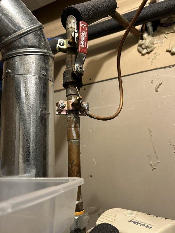 Performed comprehensive maintenance inspection on a Rheem tank-style water heater installed in 2014 located in the utility room. Evaluated the condition of the unit, associated plumbing connections including copper piping with brass fittings and shutoff valves, and adjacent HVAC ductwork system. Documented current operational status and configuration of all mechanical components to provide maintenance recommendations and estimate for any necessary repairs or replacement options.