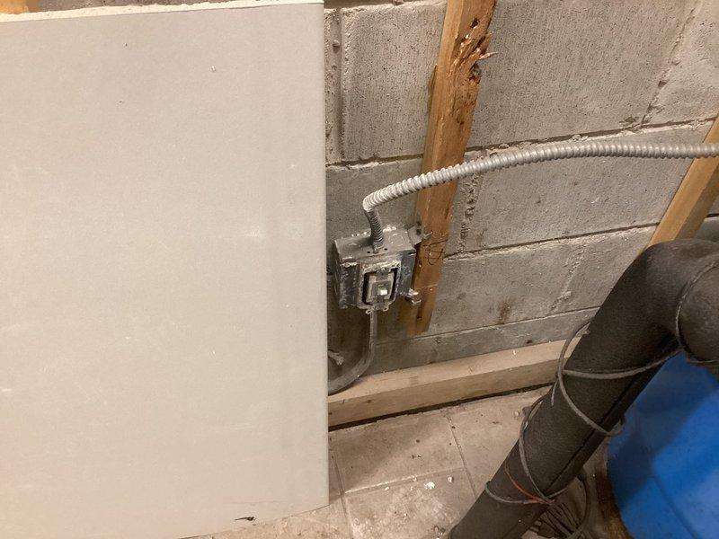 Responded to service call regarding commercial booster pump producing buzzing noise in condo building mechanical room. Conducted thorough inspection of booster pump system, pressure tank, and associated piping network including copper supply lines, valves, and connections. Evaluated pump motor operation, electrical connections via junction box and conduit, and pressure vessel components to identify source of abnormal noise. Documented existing plumbing configuration with pressure tank, shut-off valves, and multi-pipe distribution system. Provided diagnostic findings and recommended corrective actions to address buzzing condition and restore proper pump operation.