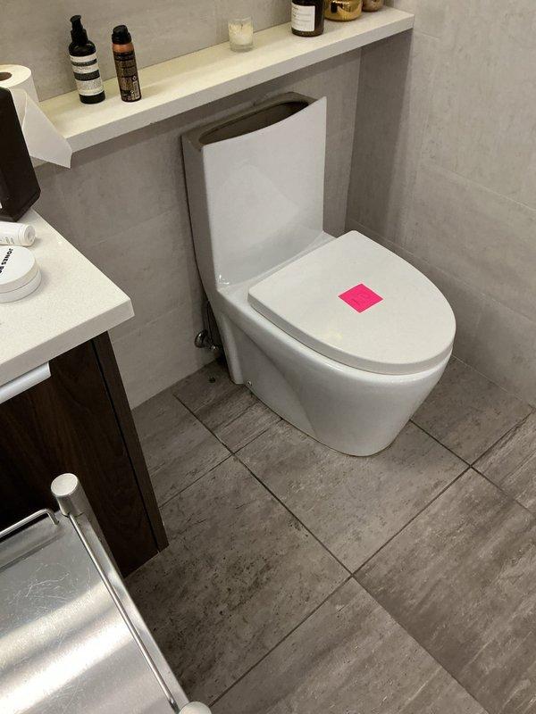 Responded to service call for leaking toilet in 10-year-old residential property. Upon arrival, contacted customer as requested and performed thorough inspection of bathroom fixtures. Diagnosed source of toilet leak at base connection point. Successfully reset toilet with new wax ring seal and closet bolts, ensuring proper alignment and secure mounting to floor flange. Verified bathtub installation and reset as needed per customer request. Tested all fixtures for proper operation and confirmed no active leaks. Documented completed work with photographs showing final installation condition and proper fixture placement.