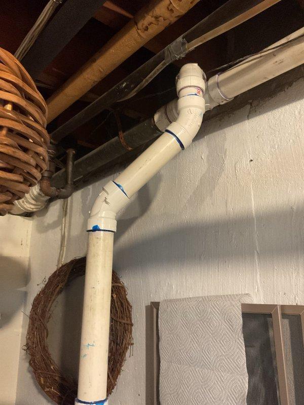 Responded to service call for multiple plumbing issues including toilet leaking from base during flushing, potential main line concerns in basement connected to PVC system, and persistent shower leak despite cartridge replacement on Hans Grohe fixture. Performed diagnostic inspection of toilet seal and wax ring integrity, assessed basement main line and PVC connections for potential repairs, and evaluated shower valve assembly to determine if alternative cartridge or additional valve component replacement required to resolve ongoing leak issue. Documented conditions with photos and provided estimates for recommended repairs to proceed with necessary work.