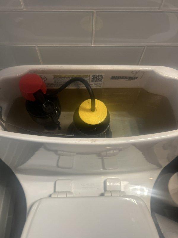 Responded to service call for multiple bathroom fixture repairs. Addressed toilet tank that was not filling properly by inspecting and servicing the fill valve assembly and float mechanism. Repaired malfunctioning toilet handle on second toilet to restore proper flushing operation. Completed necessary repairs to bathroom sink faucet assembly, ensuring proper water flow and operation of the three-piece chrome fixture with center spout and dual handles. All fixtures tested and confirmed operational upon completion.
