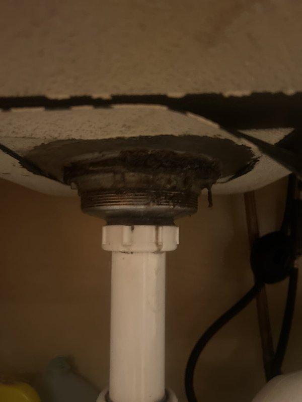 Responded to no-water callback following previous service visit. Inspected plumbing connections beneath sink fixture and bathtub installation. Documented existing conditions including discolored mounting hardware and PVC pipe connections under sink, along with standard bathroom plumbing fixtures including chrome faucet assembly and tub spout. Assessed water supply system to identify and resolve service interruption issue, restoring water flow to the residence.