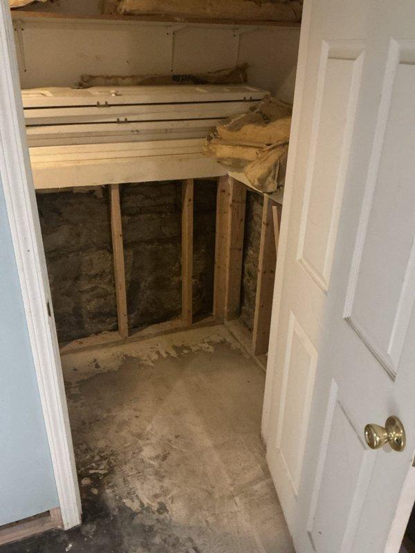 Replaced deteriorated water service line from main to residence. Excavated damaged concrete and asphalt surface area in front yard to access existing compromised service line. Installed new water service line with proper depth and grade, ensuring code-compliant connection to municipal water main. Accessed interior shut-off valve location through closet space, exposing wall framing to verify routing and install new interior connections. Completed pressure testing to confirm system integrity and proper flow rate throughout the property.