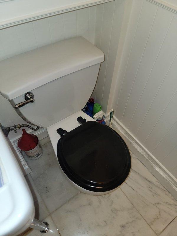 Responded to water leak emergency in century-old residential property where leaking toilet had caused water damage to unit below. Upon arrival, inspected toilet assembly, water supply connections, and floor drain system. Identified source of leak at toilet base and assessed extent of water intrusion through floor. Performed necessary repairs to toilet seal and water supply line, tested all connections for proper operation, and verified leak was resolved. Cleaned and sanitized affected floor area around toilet and drain opening to prevent mold growth and ensure sanitary conditions following water exposure.