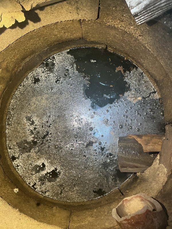 Completed sump pit inspection and repair at residential property. Assessed deteriorated sump pit with standing water, foam accumulation, and corroded pipe fittings. Addressed drainage issues affecting outdoor concrete patio area adjacent to wooden staircase structure. Customer payment received in full upon completion of sold repair work.