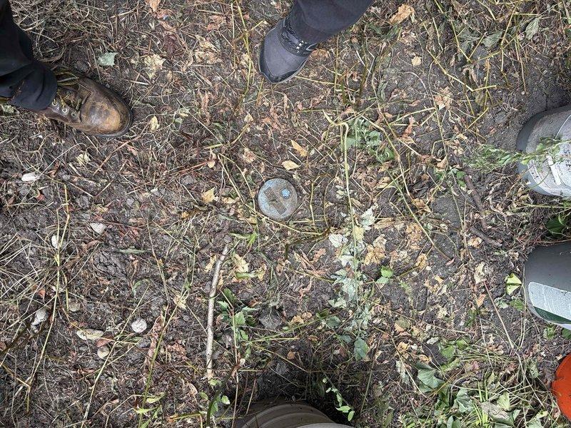 Conducted on-site inspection of underground plumbing system access point. Located and assessed buried septic tank or sewer cleanout cover in residential yard area. Presented repair and maintenance options to property owner, resulting in successful sale of recommended plumbing services for future work completion.