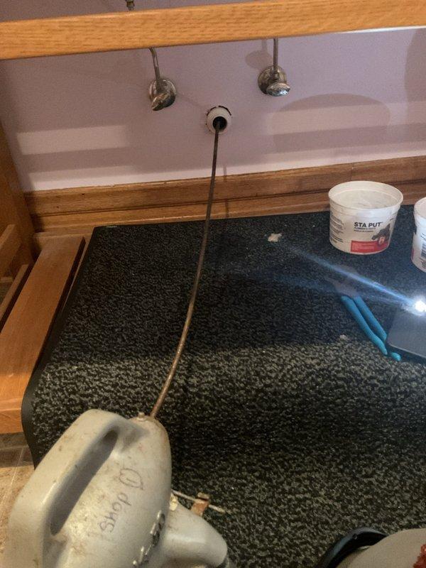 Responded to a single-fixture drainage issue in a century-old residential property. Upon arrival, assessed the affected sink and determined the stoppage was localized to that fixture. Utilized a motorized drain snake/auger to clear the obstruction from the drain line. Successfully removed the blockage and restored proper drainage flow. Tested the fixture to confirm water was draining freely with no backup. The work was completed within the scheduled timeframe, and the fixture was returned to full operational status.