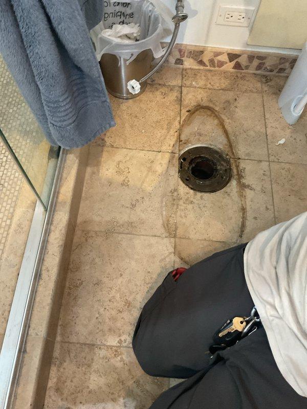 Responded to a multi-unit building for clogged toilet with water infiltration to unit below. Pulled and reset two toilets with replacement of failed wax rings and installation of new cast iron closet flanges. Performed main line rodding with Spartan equipment to clear blockage, followed by camera inspection to verify clearance and locate any additional issues in the drainage system.
