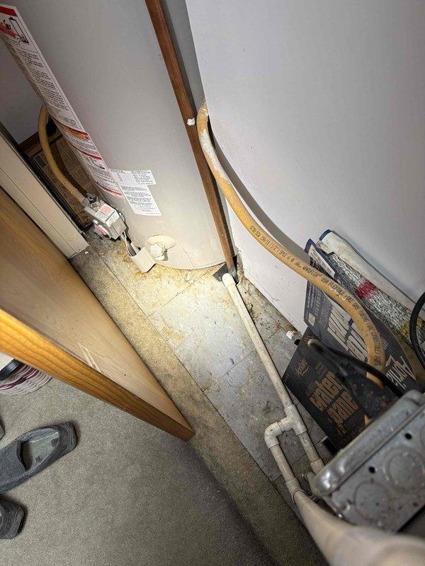 Responded to leak originating from ceiling in unit below. Upon inspection of mechanical room and HVAC equipment area, assessed copper piping, water heater connections, and drainage systems for source of water intrusion. Documented existing plumbing infrastructure including copper supply lines, PVC drainage piping, and water heater installation to identify leak pathway and coordinate repairs with affected units.