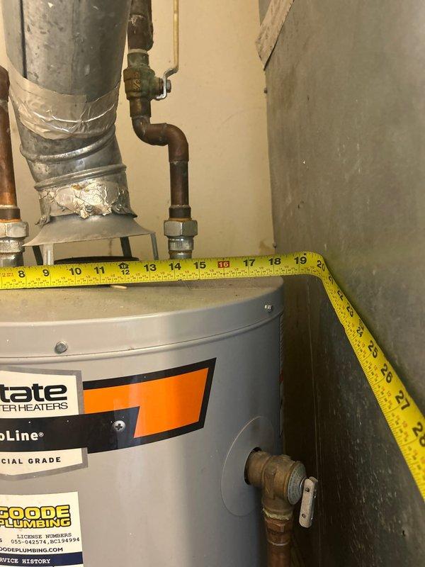 Responded to no hot water complaint and assessed failed tank water heater originally installed in 2021. Documented existing State brand water heater installation with measurements and photographed current condition of unit, including all connections, piping configuration, and mechanical room layout for estimate preparation.