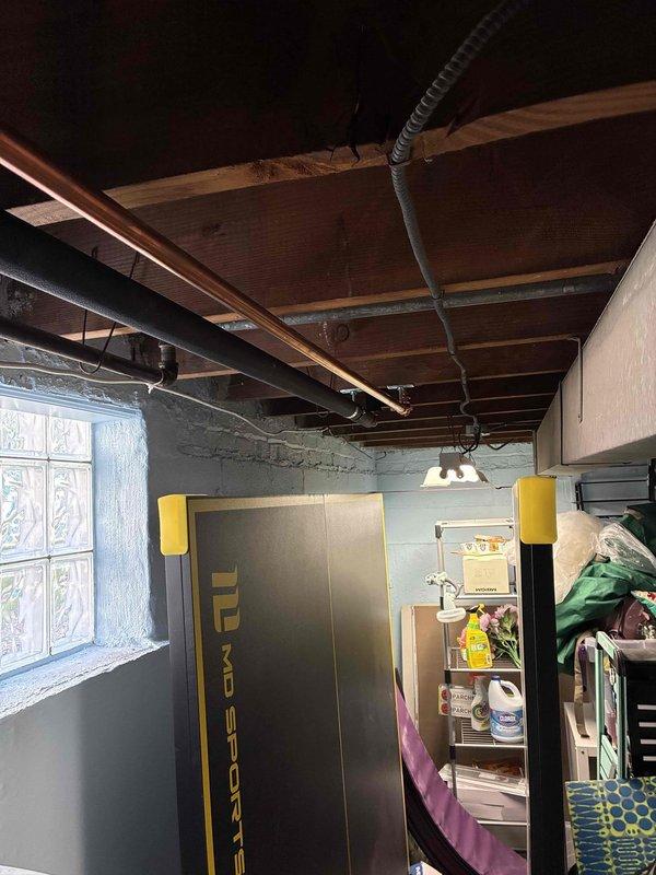 Conducted comprehensive assessment of basement plumbing system including copper supply lines, drainage configuration, and utility sink setup. Client approved proposed repairs with installation scheduled for approximately five working days of work. Documentation completed with detailed photographic records of existing conditions including exposed piping network, expansion tanks, and current plumbing infrastructure for reference during upcoming repair phase.