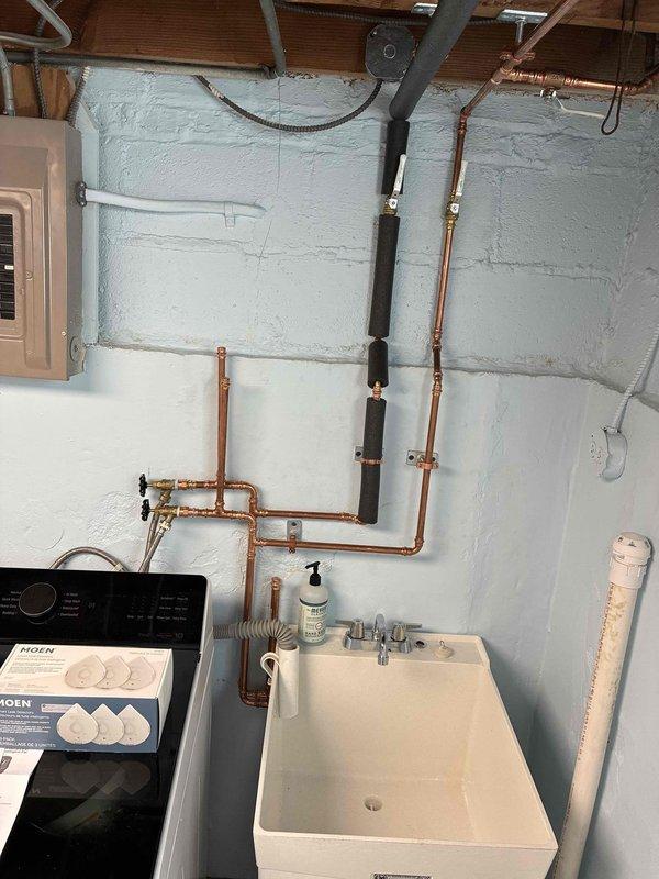 Conducted comprehensive assessment of basement plumbing system including copper supply lines, drainage configuration, and utility sink setup. Client approved proposed repairs with installation scheduled for approximately five working days of work. Documentation completed with detailed photographic records of existing conditions including exposed piping network, expansion tanks, and current plumbing infrastructure for reference during upcoming repair phase.