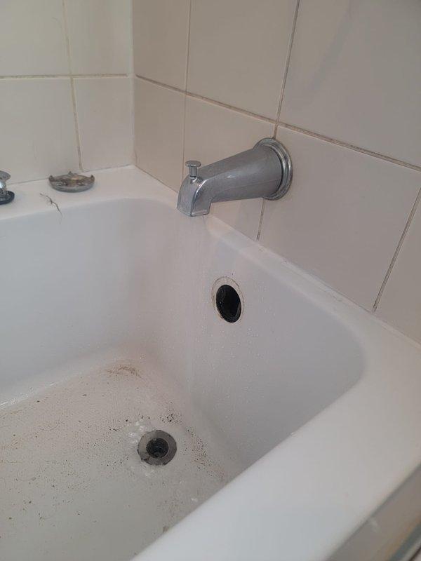 Responded to a clogged shower drain with approximately 6 inches of standing water backup. Successfully rodded the drain line to restore proper drainage and clear the obstruction, returning the fixture to normal operation.
