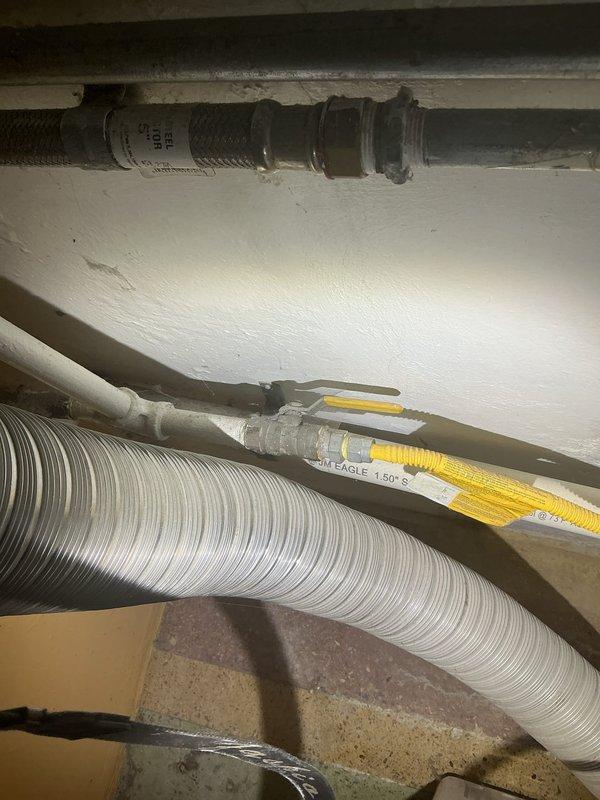 Conducted site assessment of utility room to provide quote for laundry hookup installation. Inspected existing plumbing infrastructure, HVAC ductwork, and available space for washer and dryer connections. Documented current configuration of water supply lines, drainage access points, and electrical conduit routing to determine feasibility and scope of work required for proper appliance installation.