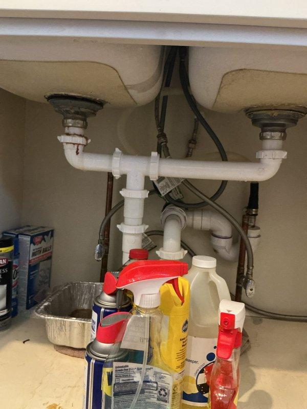 Responded to service call for leaking kitchen faucet and loose bathroom sink fixture. Inspected under-sink plumbing in kitchen, examining drain assemblies, P-trap configuration, and supply line connections for signs of leakage. Tightened bathroom sink fixture mounting hardware to eliminate movement and prevent water seepage in secondary location. Both fixtures secured and tested for proper operation with no active leaks detected upon completion.