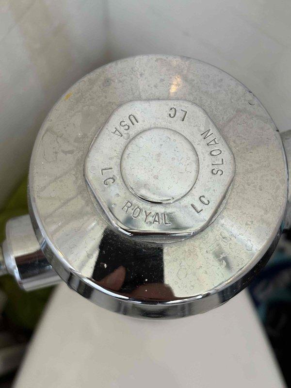 Responded to service call for loose toilet fittings in a 105-year-old building. Inspected and tightened mounting hardware on tankless toilet system (American Standard, 1.6 gpf/6.0 Lpf). Verified all chrome-plated fittings were properly secured to prevent wobbling and ensure stable operation. Toilet showed no signs of leaks or functional impairment. Documented equipment condition with photographs for service records.