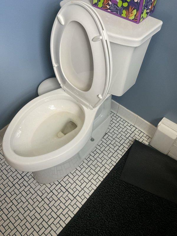 Responded to service call for non-functioning toilet flush mechanism. Upon arrival, inspected toilet tank components and identified faulty flush valve assembly preventing proper water release from tank to bowl. Replaced defective flush valve with new assembly, adjusted water level in tank to manufacturer specifications, and tested flush operation multiple times to confirm proper function. Toilet now operates normally with full, complete flush cycle restored.