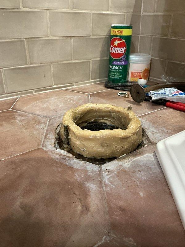 Replaced deteriorated wax ring seal on guest bathroom toilet after removing fixture and cleaning corroded flange area. Cleared slow-draining master bathroom shower using mechanical rodding equipment to restore proper drainage. Both fixtures tested and confirmed operational upon completion.