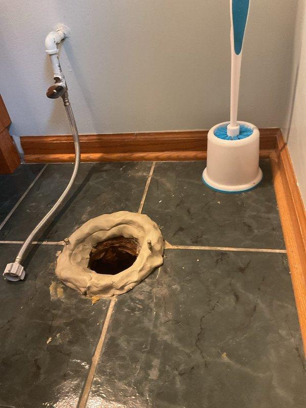 Responded to service call for clogged bathtub drain and suspected toilet leak. Successfully rodded and cleared the bathtub drain to restore proper water flow. Performed inspection of toilet installation and confirmed leaking wax ring seal at floor flange. Removed toilet from mounting flange, replaced deteriorated wax ring with new seal, and reinstalled toilet to manufacturer specifications. Verified proper seating and tested for leaks. Both fixtures are now functioning properly with no active leaks detected.
