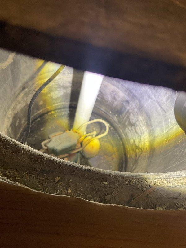 Conducted site assessment for battery backup sump pump system installation at a condominium building. Inspected existing plumbing infrastructure including drainage lines, vent pipes, and utility access points to determine optimal placement and integration requirements. Photographed current conditions of ductwork openings and plumbing chase area, documenting wire routing, PVC pipe configurations, and floor penetrations to develop comprehensive installation quote for backup pump system with battery capability.