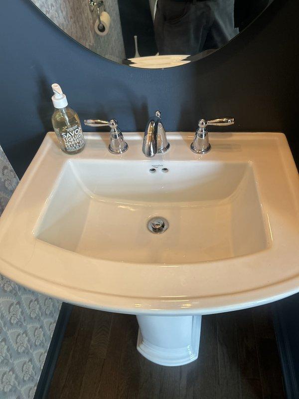 Responded to high water bill concern and performed comprehensive visual leak inspection of plumbing fixtures and accessible areas. Thoroughly examined bathroom fixtures including sink, toilet, bathtub, and associated supply lines and drain connections for signs of active leaks, moisture damage, or water intrusion. No visible leaks, dripping fixtures, water staining, or moisture accumulation detected during inspection. All fixtures appeared to be functioning properly with no evidence of ongoing water loss at time of service. Documentation provided for property management review.
