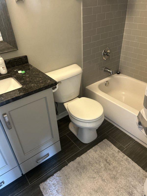 Responded to high water bill concern and performed comprehensive visual leak inspection of plumbing fixtures and accessible areas. Thoroughly examined bathroom fixtures including sink, toilet, bathtub, and associated supply lines and drain connections for signs of active leaks, moisture damage, or water intrusion. No visible leaks, dripping fixtures, water staining, or moisture accumulation detected during inspection. All fixtures appeared to be functioning properly with no evidence of ongoing water loss at time of service. Documentation provided for property management review.