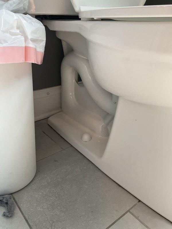 Responded to clogged toilet that would not clear with plunging after a large hair clip was flushed by a toddler. Protected work area with drop cloth and removed toilet from floor flange to access and clear obstruction from the trapway. Retrieved foreign object, reinstalled toilet with new wax ring seal, and tested for proper flush operation and drainage.