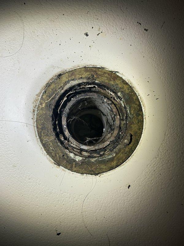 Conducted on-site assessment for lead service line replacement from main water supply to residence. Evaluated existing plumbing system for additional concerns including corroded shower drain assembly requiring replacement and investigated hydraulic shock issues causing pipe banging throughout the system. Documented property conditions and existing infrastructure to prepare comprehensive estimate for lead line replacement project, drain fixture upgrade, and water hammer arrestor installation recommendations.