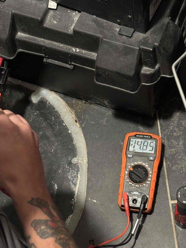 Responded to service call for sump pump making loud noise. Upon inspection, tested electrical components with digital multimeter and confirmed proper voltage at 24.85V to control circuit. Inspected PVC drainage piping system, drain pan assembly, and associated plumbing connections for proper operation and secure mounting. Verified all pipe joints, fittings, and discharge lines were properly configured with no obstructions or drainage issues that could cause operational noise. System tested and returned to normal operation.