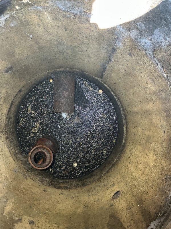 Responded to a plumbing emergency involving a semi-collapsed sewer line discovered through video inspection, located approximately 25 feet from the house. Assessed the damaged section and determined that 6-8 feet of underground piping requires replacement due to partial structural failure. Documented the utility access points and surrounding landscape conditions, including the location of the cleanout cover in the mulched garden area near landscaping features, to prepare an estimate for excavation and pipe replacement work.