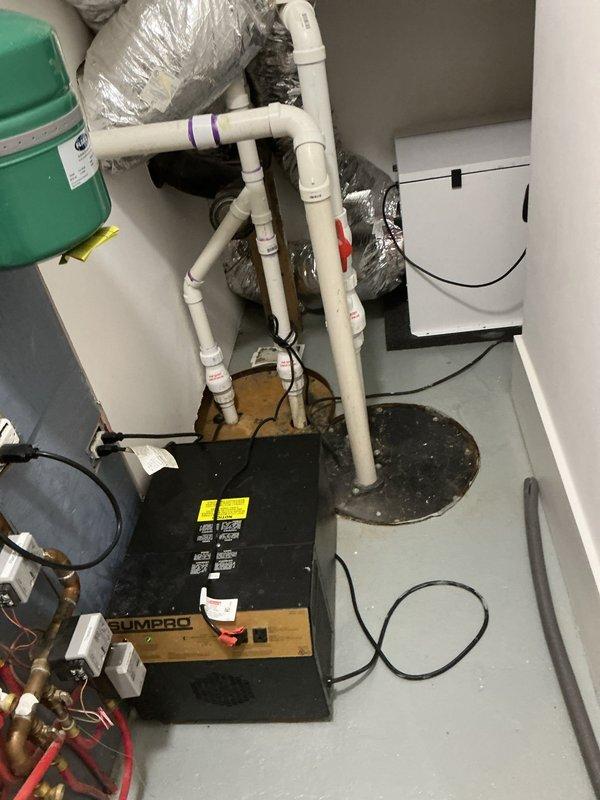 Responded to low water pressure complaint affecting multiple bathrooms with extended warm-up time and inadequate hot water temperature. Inspected plumbing system and mechanical room, examining water supply lines, pressure regulators, and water heating equipment. Performed winterization service on exterior hose bibs by draining lines and shutting off interior shut-off valves to prevent freeze damage during cold weather months.