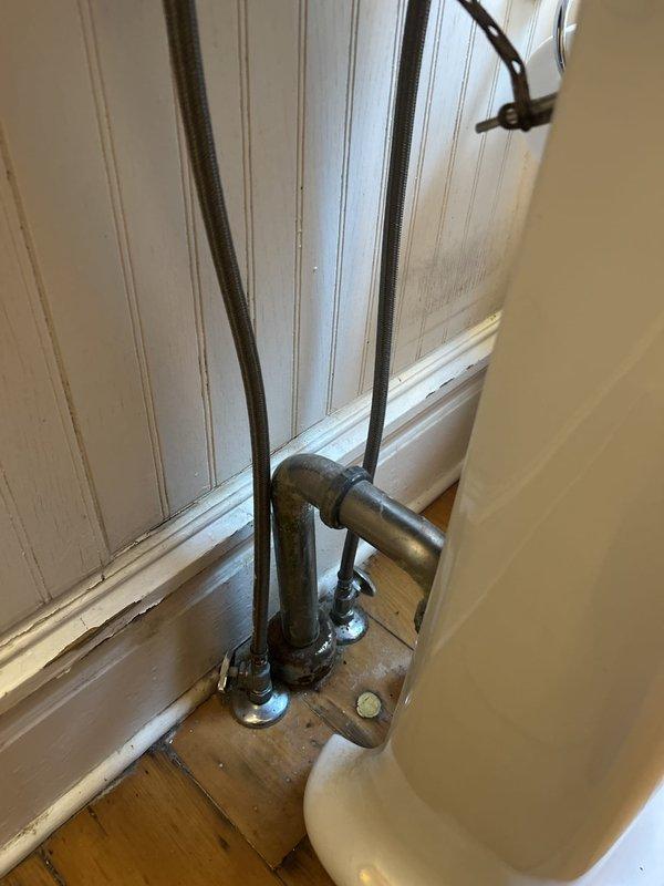Replaced existing P-trap assembly with new chrome-plated P-trap fixture beneath sink. Removed old trap connections, installed new U-bend trap with threaded connections, and ensured proper seal at all connection points. Verified drainage flow and tested for leaks to confirm proper operation of the new plumbing fixture.