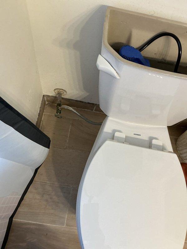 Responded to service call for toilet randomly running intermittently. Upon inspection, removed tank lid and diagnosed faulty flapper valve assembly causing inconsistent seal and allowing water to leak from tank into bowl, triggering fill valve to activate periodically. Replaced worn flapper valve and adjusted chain length to ensure proper seating and complete seal when flush cycle completes. Tested flush mechanism multiple times to verify proper operation and confirm intermittent running issue was resolved.