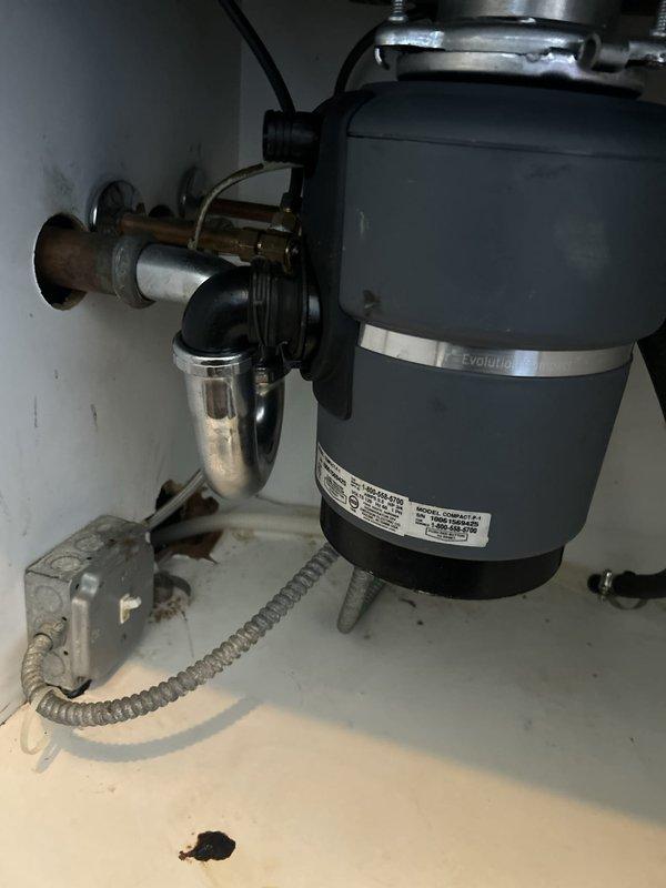 Responded to service call for corroding pipe replacement under kitchen sink. Upon inspection, identified deteriorated copper supply line requiring replacement. Removed old corroded piping and installed new chrome P-trap assembly, ensuring proper connections to existing garbage disposal unit and drain system. Verified all connections were secure, tested for leaks, and confirmed proper drainage function before completing the service.
