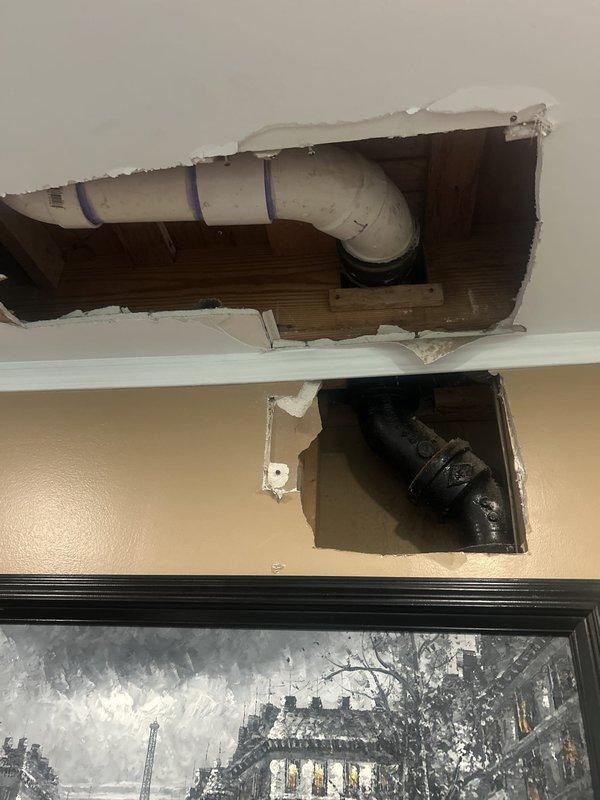 Responded to recurring upstairs drain blockages where water and toilet paper were backing up through the shower drain. Performed assessment of existing plumbing configuration and accessed ceiling and wall cavities to inspect PVC drainage piping and routing. Provided estimate for reconfiguring upstairs piping system to resolve chronic drainage issues and prevent future backups.