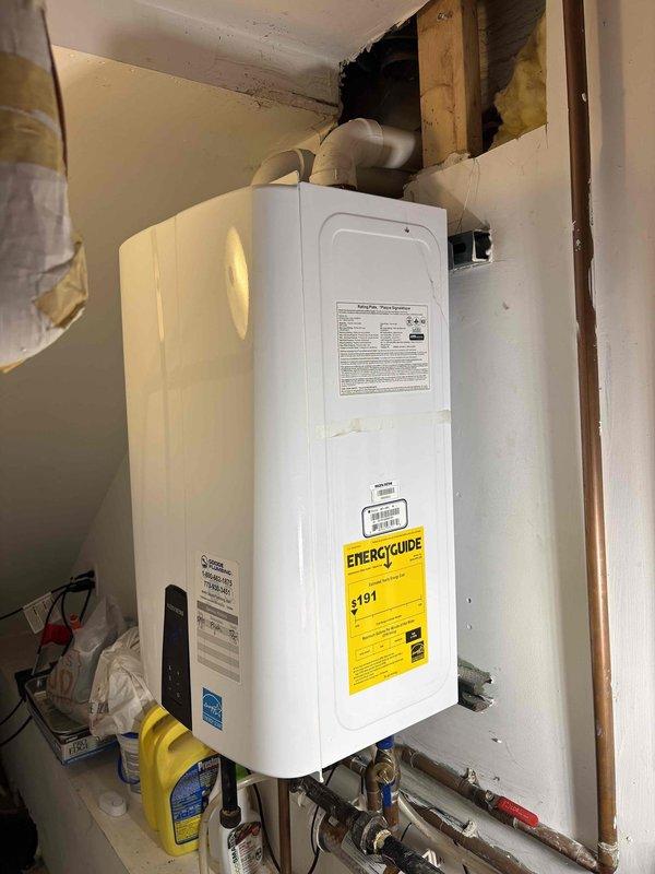 Performed annual maintenance flush on tankless water heater unit to remove mineral buildup and ensure optimal performance. Isolated unit, circulated descaling solution through heat exchanger, flushed system thoroughly, and verified all connections and venting remained secure. Unit tested successfully after service with no leaks detected and proper operation confirmed.