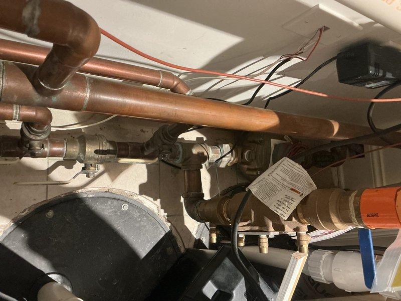 Responded to multiple plumbing issues including two toilets with continuous running, repaired bathtub faucet with improper water distribution between spout and handheld sprayer, and replaced broken main shower hose. Inspected non-functional water pressure booster pump system that had been bypassed; assessed pump components and plumbing configuration to determine system status and provide recommendations for restoration of proper water pressure throughout the residence.