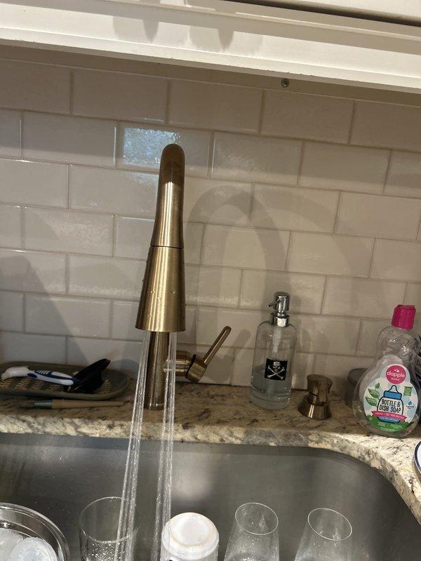 Responded to whole-house low water pressure complaint that persisted following recent faucet replacement by another contractor. Conducted comprehensive pressure diagnostics at multiple fixtures throughout the residence, including the newly installed kitchen faucet. Traced pressure loss to partially closed main water supply valve at the meter, which was restricting flow to the entire property. Fully opened the main shutoff valve and verified restored pressure at all fixtures, resolving the issue without need for additional repairs or component replacement.