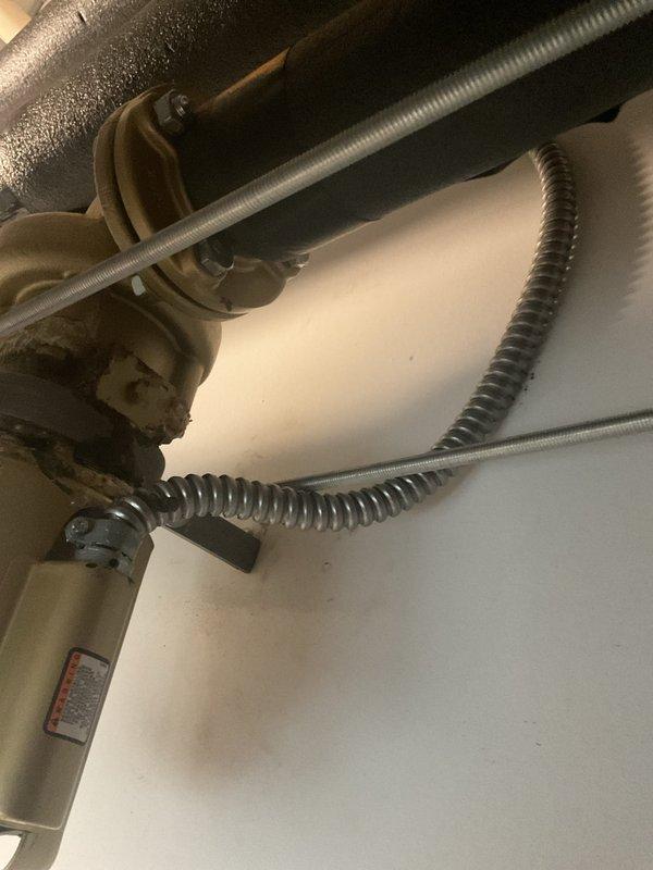 Responded to service call for leaking expansion tank on water heater system. Upon inspection, confirmed active leak at expansion tank connection point. Documented existing equipment configuration including pump assembly, motor components, and associated piping. Provided estimate for expansion tank replacement including removal of failed unit, installation of new properly-sized expansion tank, pressure testing of system, and verification of proper operation upon completion.