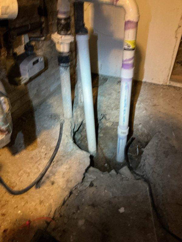 Returned to property to perform sewer line rodding and camera inspection as scheduled. Successfully cleared the main drain line and conducted video inspection to assess pipe condition and identify any underlying issues. Documented plumbing system configuration including newly installed PVC drainage pipes and utility room mechanical equipment for service records.