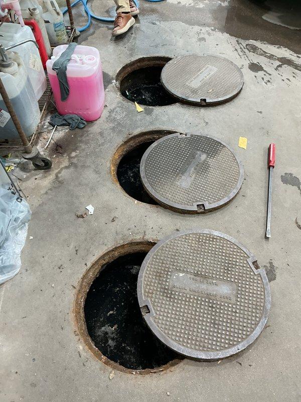 Responded to commercial restroom maintenance request involving continuously running toilet and drainage backup in wash area. Replaced defective toilet fill valve assembly that was causing constant water flow. Accessed and cleared multiple floor drain access ports to address sludge buildup causing backup in wash area, restoring proper drainage function to the facility.