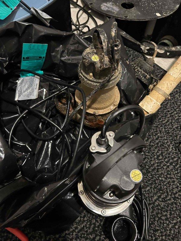 Inspected and assessed sump pump system in basement area. Removed heavily corroded and deteriorated pump components showing extensive rust, surface degradation, and material flaking. Documented existing pump assembly condition including mechanical fittings, discharge piping, and basin interior with standing water. Presented replacement recommendations based on advanced corrosion of critical pump components and provided photographic evidence of system condition to facilitate repair authorization.