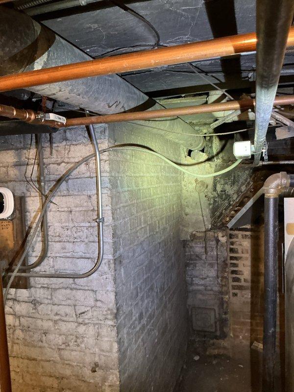 Completed installation of 8-inch flue pipe section for water heater system and applied hydraulic cement as needed to ensure proper sealing and code compliance. All components were inspected and verified operational, with existing plumbing and HVAC systems remaining fully functional throughout the installation process.
