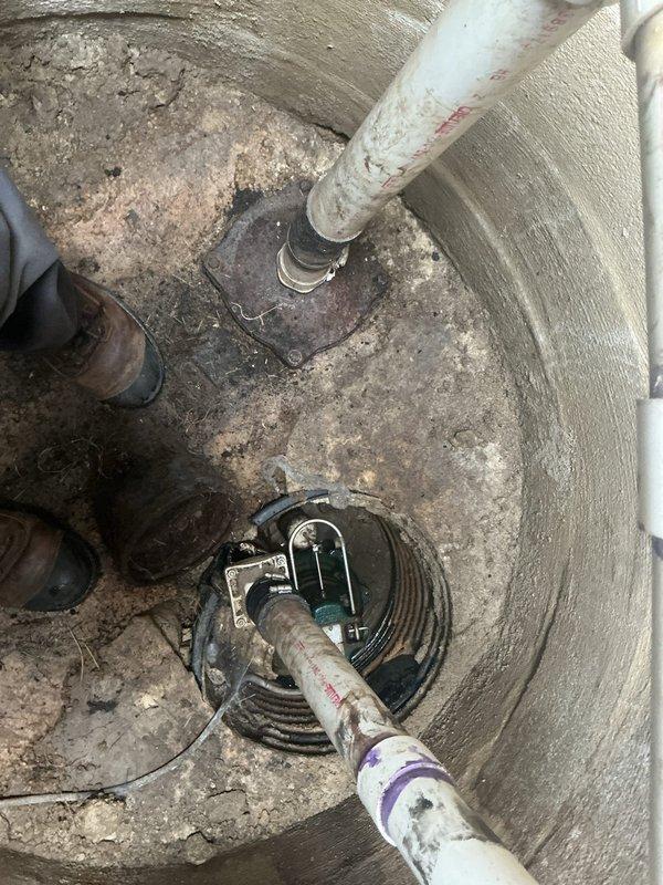 Conducted on-site assessment for flood control system installation. Inspected existing sump pump configuration in basement pit, documenting current submersible pump setup with PVC discharge piping and evaluating pit condition. Examined exterior discharge point and termination location in yard, verifying proper drainage pathway and identifying system components. Provided comprehensive estimate for complete flood control solution based on property conditions and customer requirements.