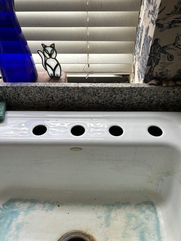 Responded to kitchen sink backup with approximately 1.5 inches of thick, mud-like material that had accumulated overnight in the basin. Upon arrival, accessed the cabinet beneath the sink and deployed drain cleaning equipment to clear the blockage. Successfully removed the obstruction and restored proper drainage to the kitchen sink, eliminating the backup condition.