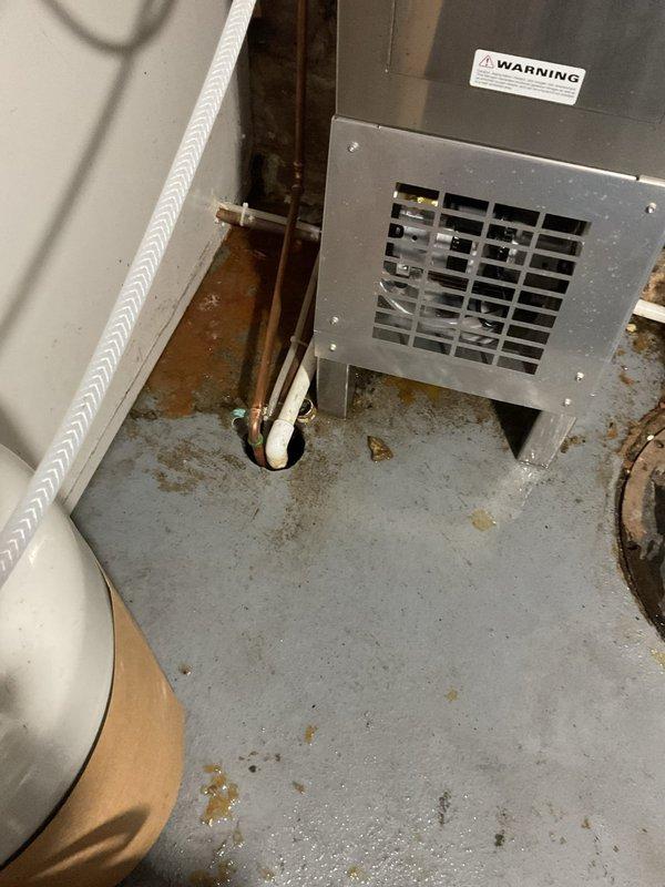 Responded to service call for clogged basement drain that was not draining properly. Upon arrival, located the affected drain in the mechanical room area near HVAC equipment and water heater. Successfully cleared the blockage and restored proper drainage function to the basement floor drain system.