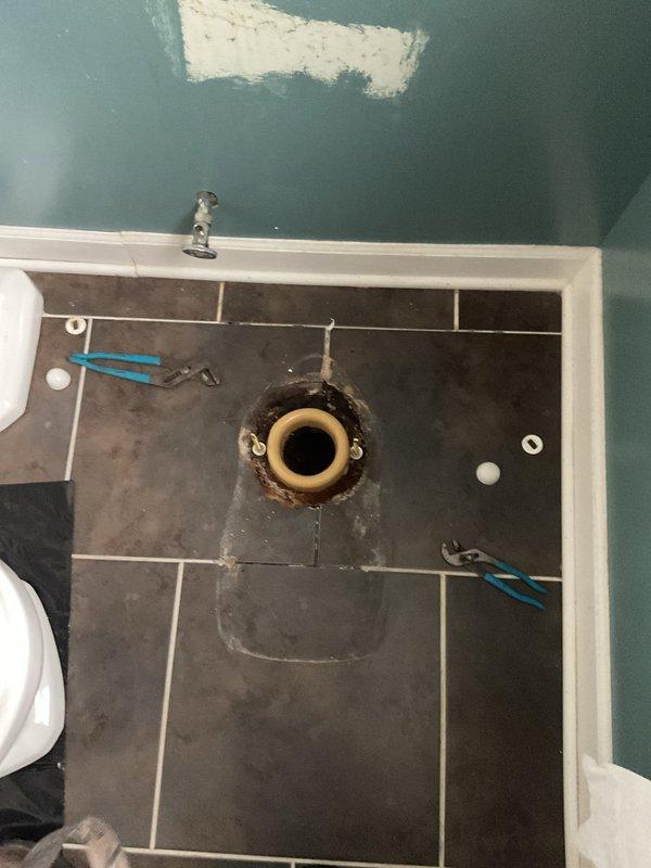 Responded to diagnostic request for possible toilet leak. Upon inspection, removed toilet from flange to assess water intrusion and verify source of suspected leak. Inspected wax ring seal, flange condition, and surrounding floor tiles for moisture damage or deterioration. Evaluated toilet base, tank-to-bowl connection, and supply line for potential leak points to determine necessary repairs.