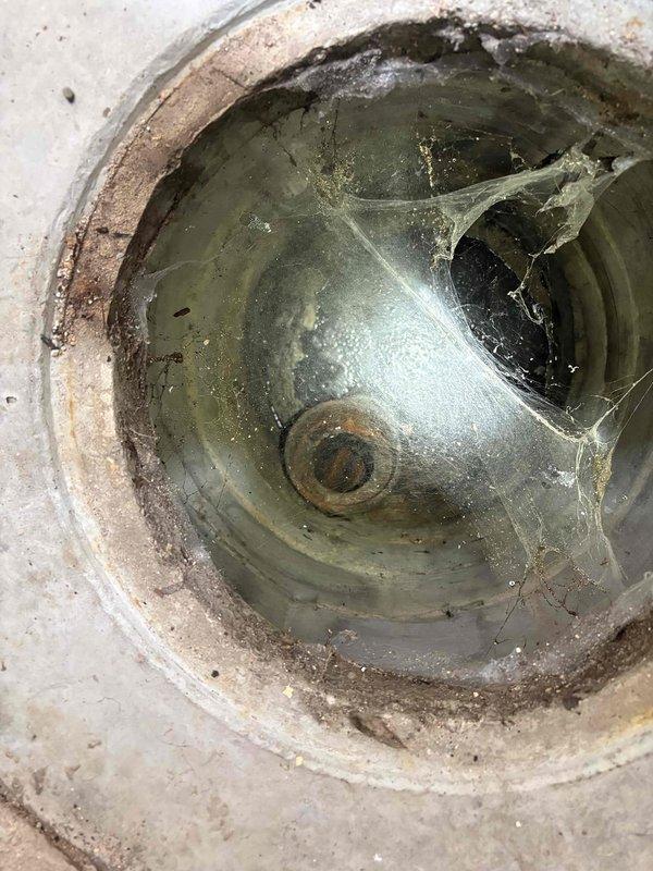 Responded to service call for main line misalignment and restricted flow in kitchen drain lines. Upon inspection, discovered significant buildup of grease, sediment, and organic debris throughout the drainage system, with visible deterioration and corrosion on drain fixtures. Performed main line repair to correct misalignment issues and restored proper drainage flow to kitchen lines. Cleared heavy accumulation of grime and sediment from affected drain components to eliminate flow restrictions and return system to full operational capacity.